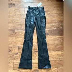 New faux leather Zara black pants. New with tags. Small . Very flattering